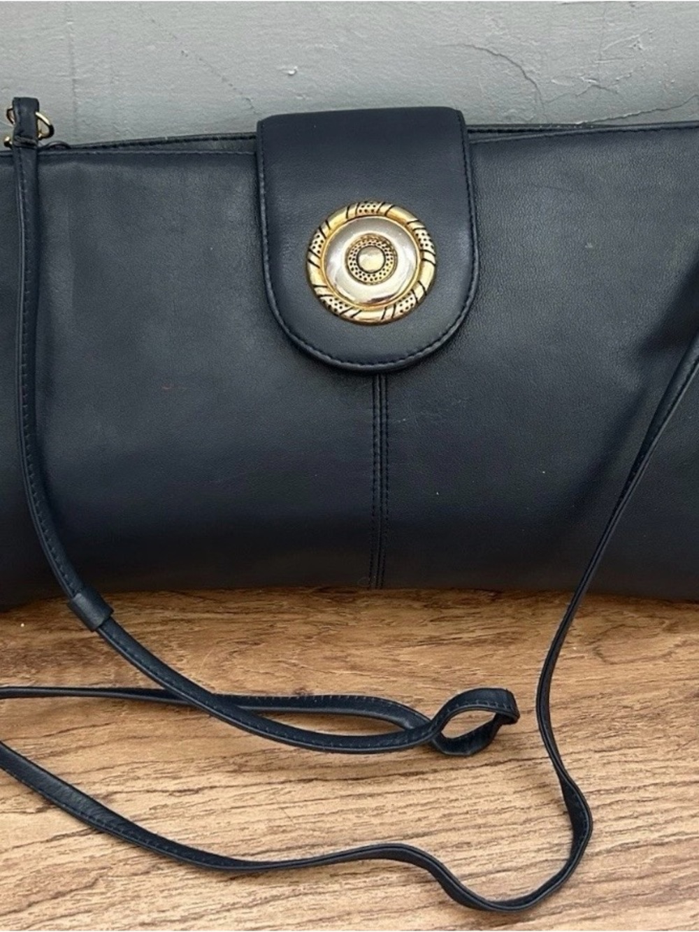 Navy Blue Leather Crossbody Bag with Gold Medallion Accent by Amanda Smith